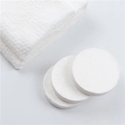 Serviette de bain compressée jetable